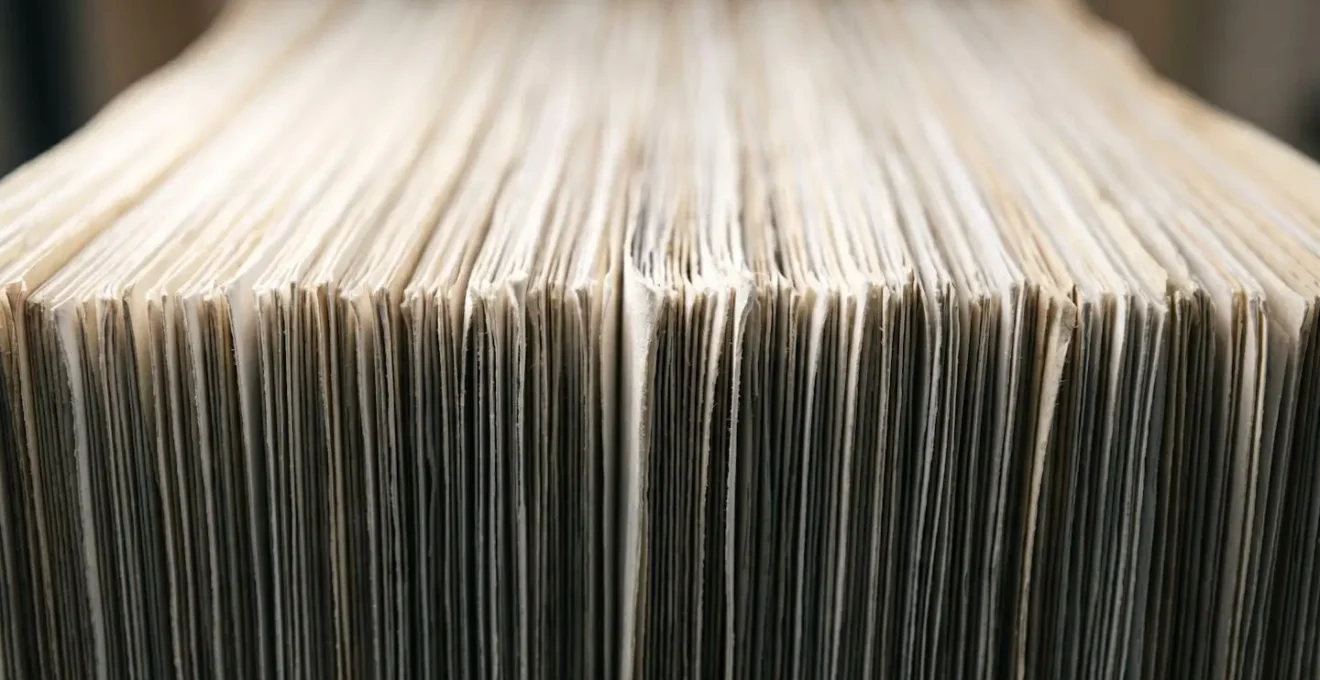 Macro close-up of legal documentation textures representing the complexity of English eviction proceedings