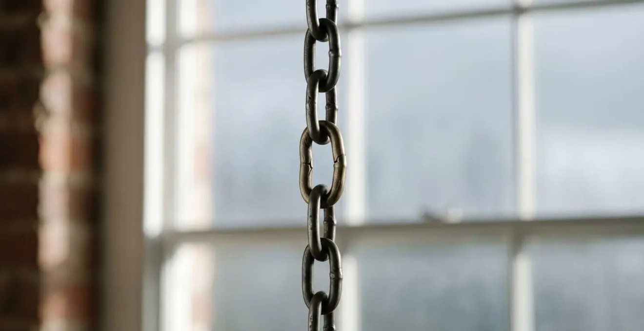 A visual metaphor representing the interconnected fragility of UK property transaction chains