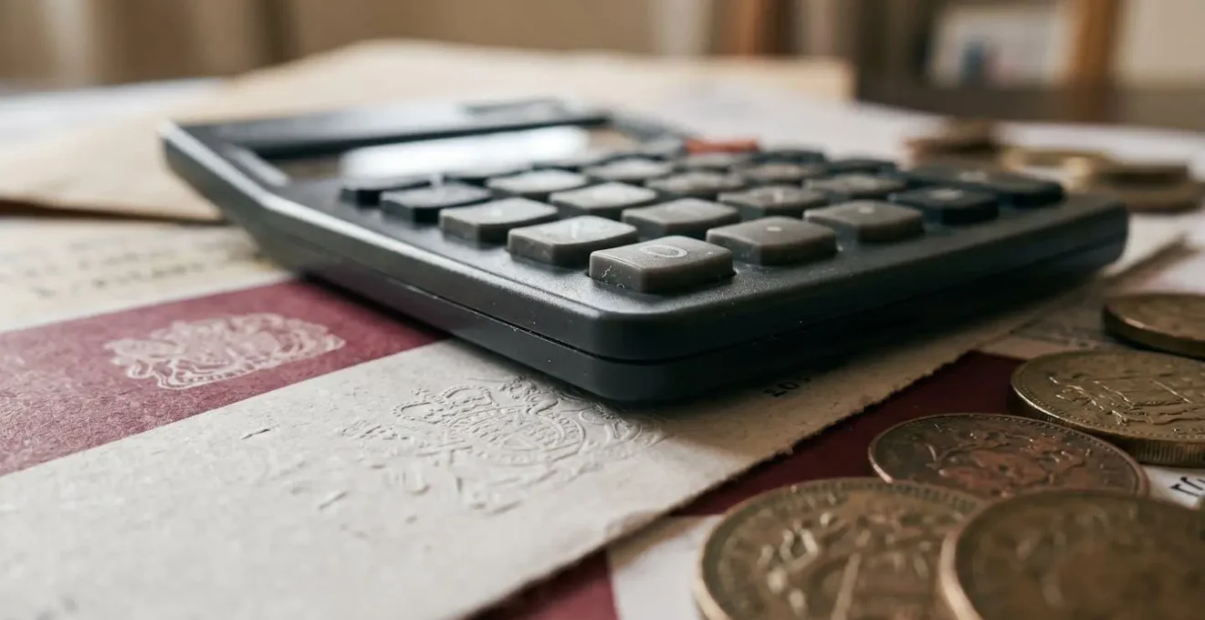 Macro close-up of UK tax calculation worksheet showing mortgage interest restrictions under Section 24