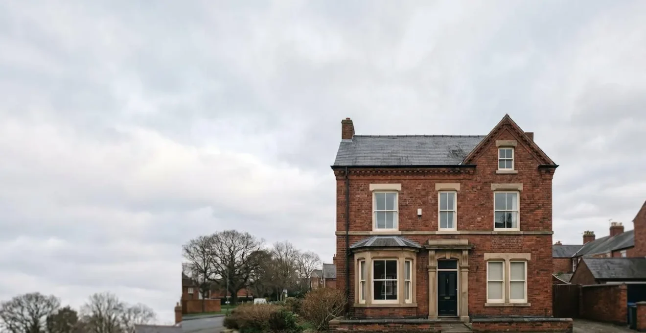 Layered architectural visualization showing progressive tax levels on English property ownership from purchase to inheritance
